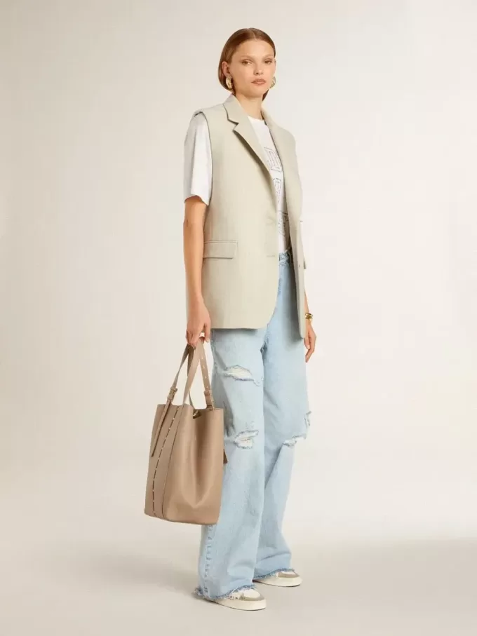 Stardan con estrella y puntera de ante beige y letras y motivos por toda la superficie