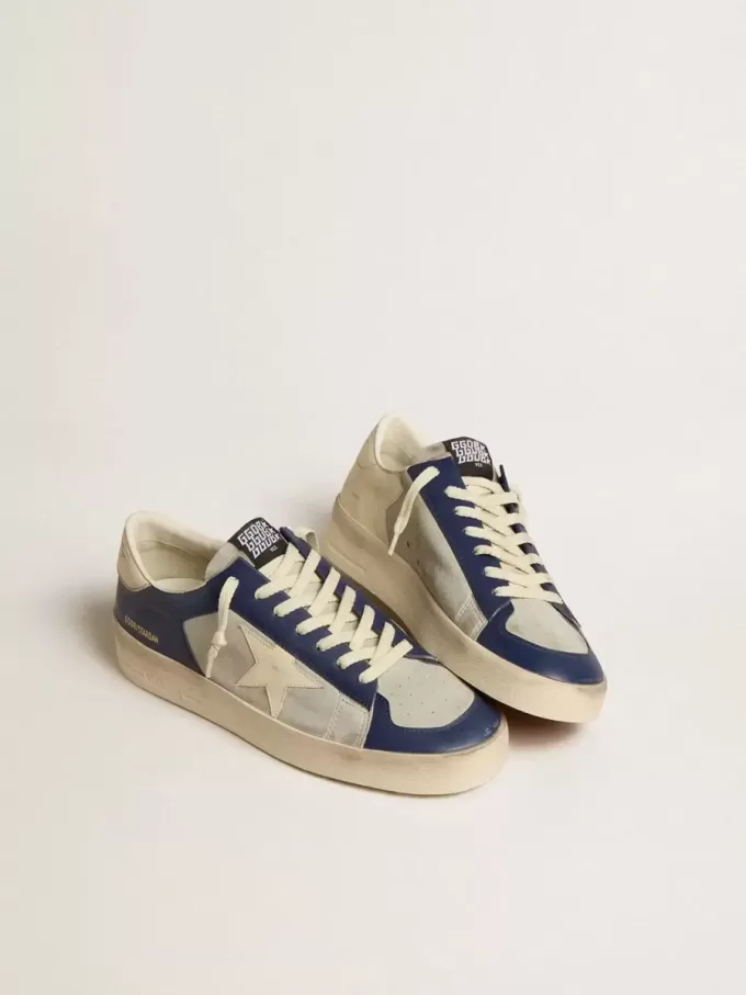 Stardan para hombre en piel gris y azul con estrella y lengüeta en el talón de color crema