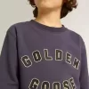 Sudadera azul violeta con las letras Golden Goose en la parte delantera Sudadera azul violeta con las letras Golden Goose en la parte delantera