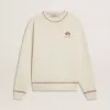 Sudadera CNY en algodón blanco desgastado con bordados rojos Sudadera CNY en algodón blanco desgastado con bordados rojos
