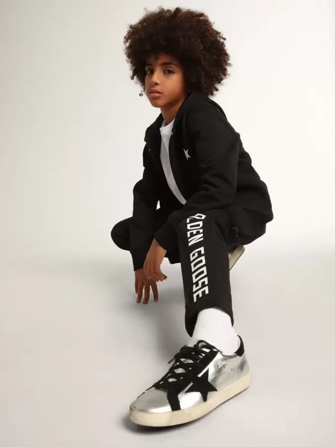 Sudadera con capucha negra con estrella y logotipo blancos en contraste Sudadera con capucha negra con estrella y logotipo blancos en contraste