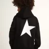 Sudadera con capucha para niño en color negro con estrellas blancas en contraste. Sudadera con capucha para niño en color negro con estrellas blancas en contraste.