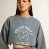 Sudadera corta en azul celeste con acabado desgastado