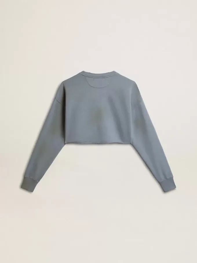 Sudadera corta en azul celeste con acabado desgastado