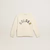 Sudadera en blanco desgastado con letras doradas multicolores en la parte delantera