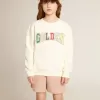 Sudadera en blanco desgastado con letras doradas multicolores en la parte delantera