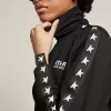 Sudadera negra con cremallera y estrellas blancas para mujer