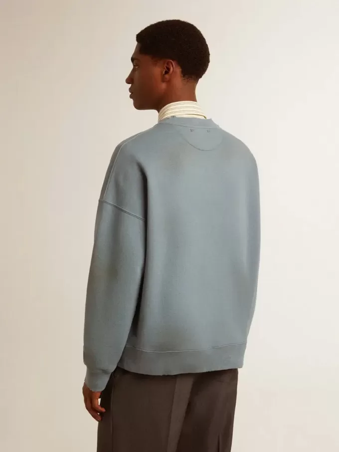 Sudadera oversize en azul celeste con acabado desgastado