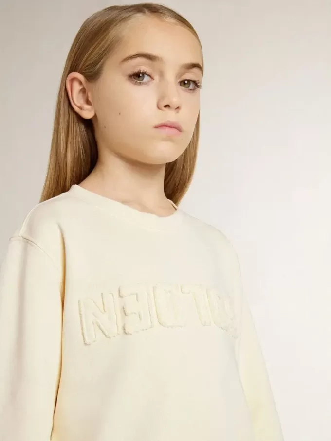 Sudadera para niña en color crema con letras bordadas