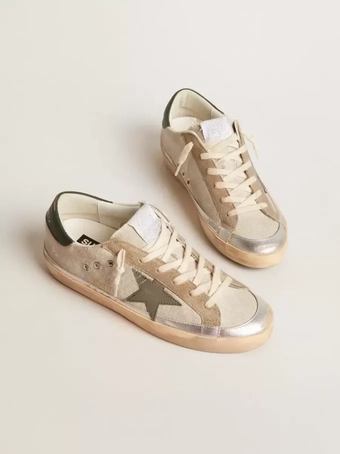 Super-Star en lona gris con estrella y lengüeta en el talón de cuero verde Super-Star en lona gris con estrella y lengüeta en el talón de cuero verde