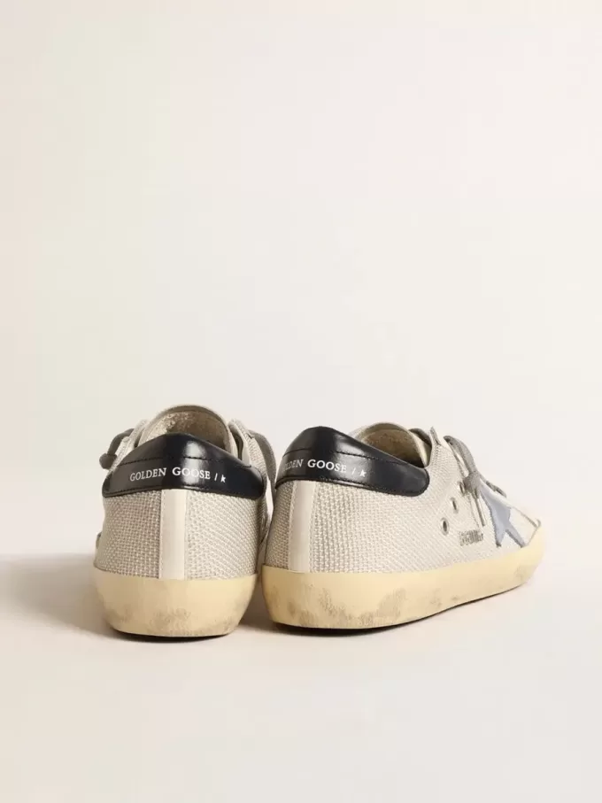 Super-Star en malla plateada pálida con estrella de ante azul claro Super-Star en malla plateada pálida con estrella de ante azul claro