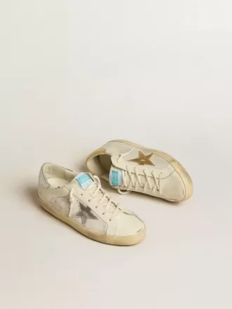 Super-Star en piel y ante blancos con estrella de piel plateada y dorada