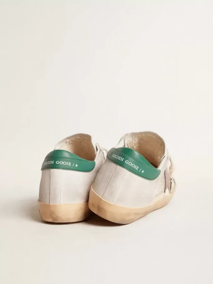 Super-Star LTD en ante con estrella de cuero rosa y lengüeta verde en el talón