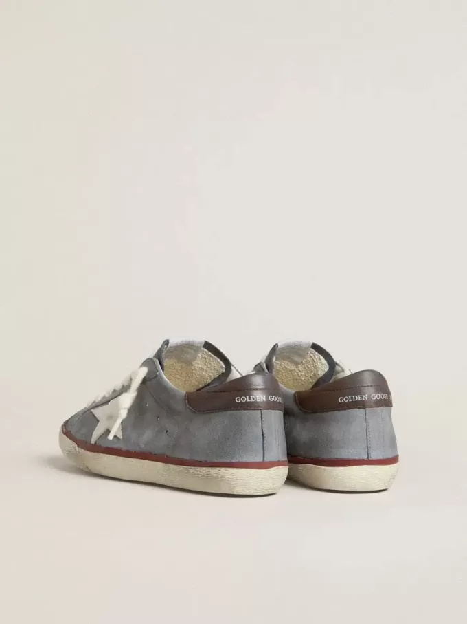 Super-Star LTD en piel nobuk azul claro con estrella de piel blanca y lengüeta del talón de piel marrón