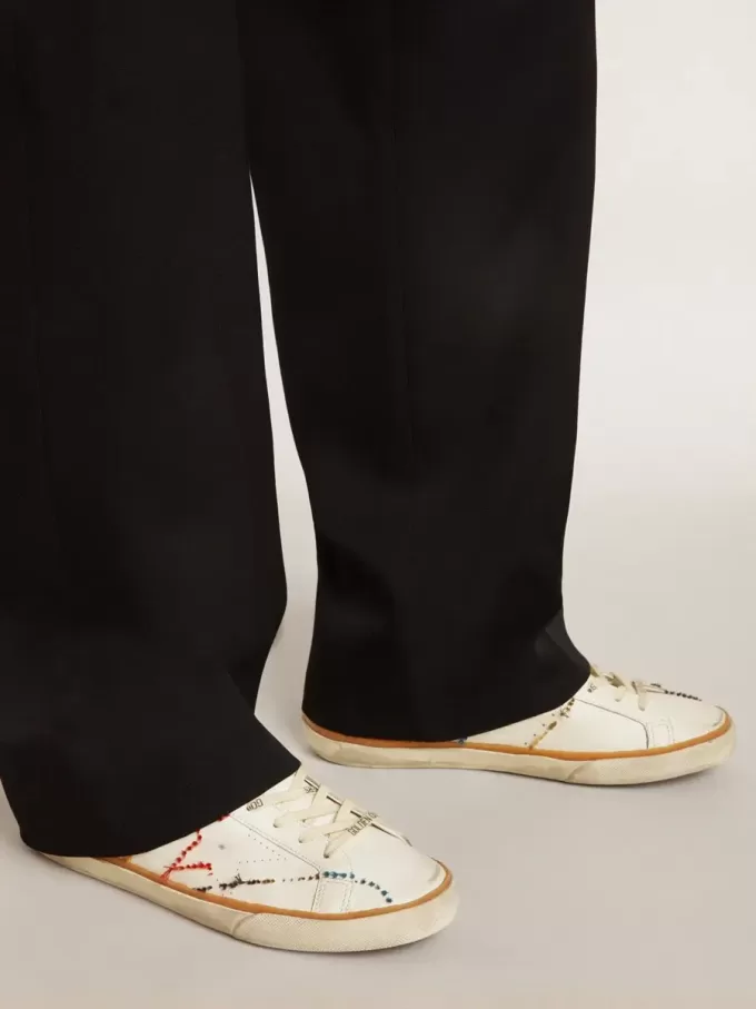 Super-Star LTD para hombre con estrella perforada y lengüeta metálica en el talón.