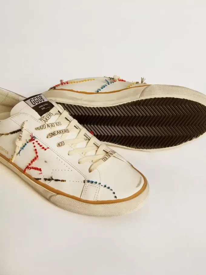 Super-Star LTD para hombre con estrella perforada y lengüeta metálica en el talón.