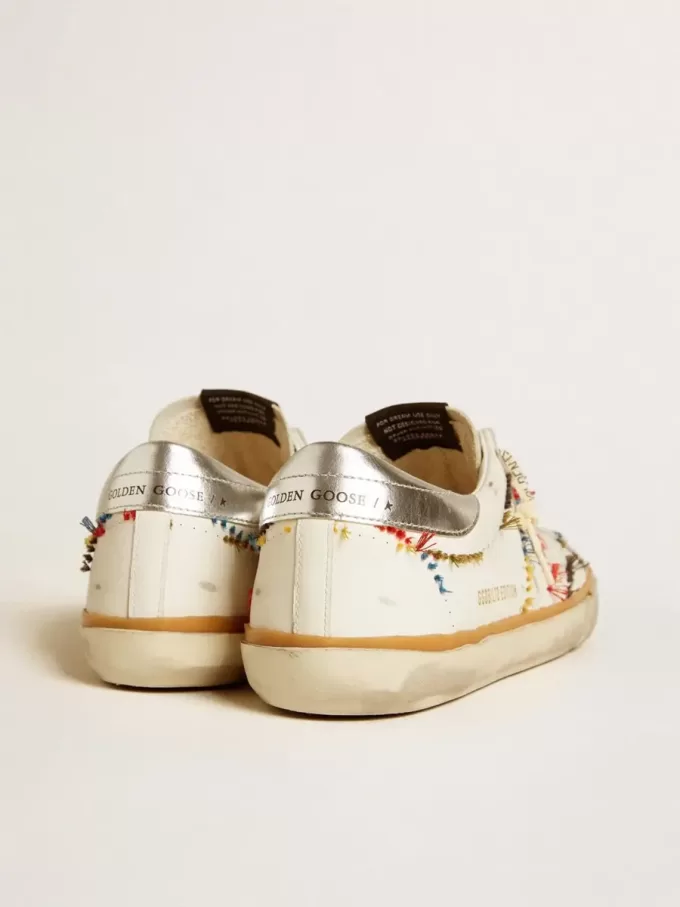 Super-Star LTD para hombre con estrella perforada y lengüeta metálica en el talón.