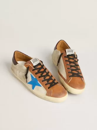 Super-Star LTD para hombre en color beige con estrella azul claro y lengüeta con estampado de cocodrilo en el talón