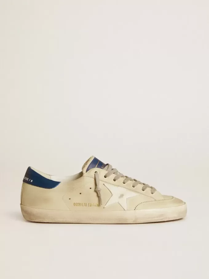 Super-Star LTD para hombre en nubuck con estrella de cuero blanco y lengüeta azul en el talón Super-Star LTD para hombre en nubuck con estrella de cuero blanco y lengüeta azul en el talón