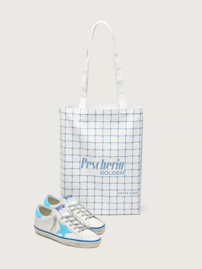 Super-Star LTD para mujer en piel blanca con estrella y lengüeta del talón en piel azul claro