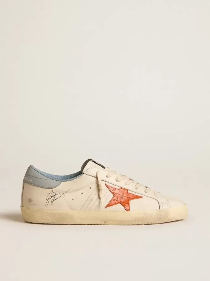 Super-Star para hombre con estrella con estampado de cocodrilo y lengüeta azul plateada en el talón Super-Star para hombre con estrella con estampado de cocodrilo y lengüeta azul plateada en el talón