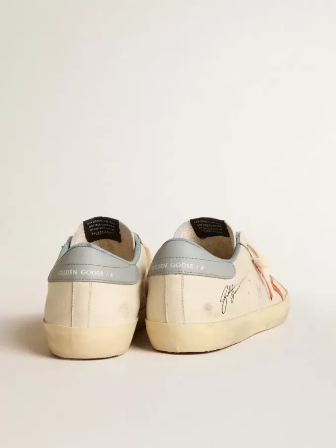 Super-Star para hombre con estrella con estampado de cocodrilo y lengüeta azul plateada en el talón Super-Star para hombre con estrella con estampado de cocodrilo y lengüeta azul plateada en el talón