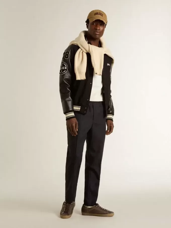 Super-Star para hombre con estrella y lengüeta en el talón en piel marrón con efecto desgastado.