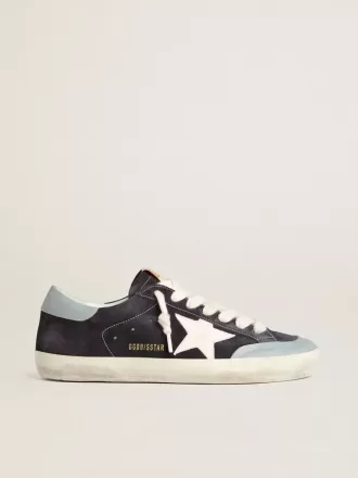 Super-Star para hombre en ante azul medianoche con estrella de cuero blanco y lengüeta del talón de cuero azul claro Super-Star para hombre en ante azul medianoche con estrella de cuero blanco y lengüeta del talón de cuero azul claro
