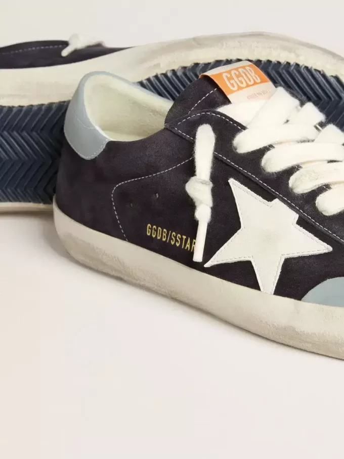 Super-Star para hombre en ante azul medianoche con estrella de cuero blanco y lengüeta del talón de cuero azul claro