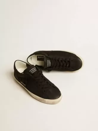 Super-Star para hombre en nubuck negro con estrella perforada y lengüeta del talón en nubuck negro Super-Star para hombre en nubuck negro con estrella perforada y lengüeta del talón en nubuck negro
