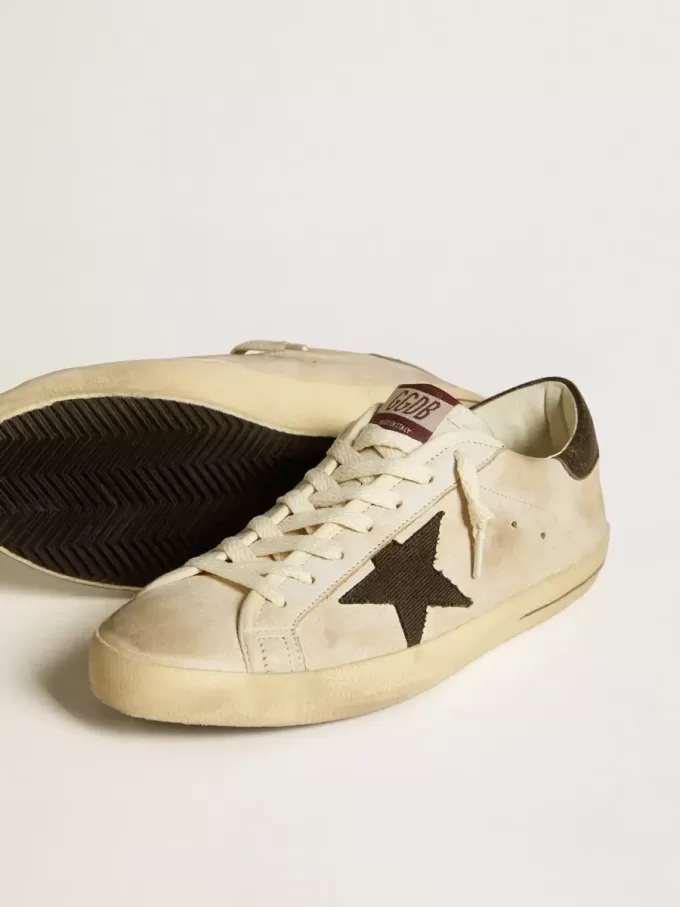 Super-Star para hombre en piel con estrella de denim negro y lengüeta del talón en piel negra