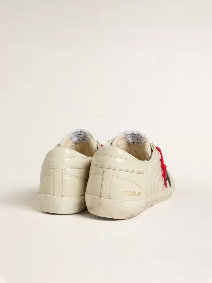 Super-Star para hombre en piel matelassé blanca brillante con estrella de piel negra