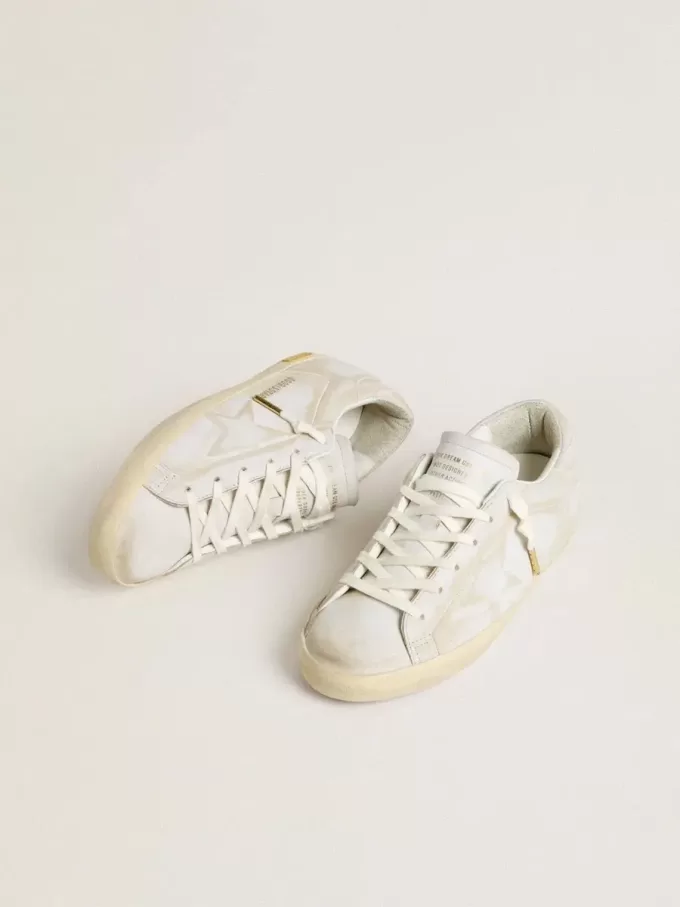 Super-Star para mujer con estrella de cuero blanco y lengüeta en el talón con efecto desgastado Super-Star para mujer con estrella de cuero blanco y lengüeta en el talón con efecto desgastado