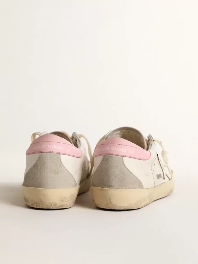 Super-Star para mujer con estrella de cuero plateada y lengüeta rosa en el talón