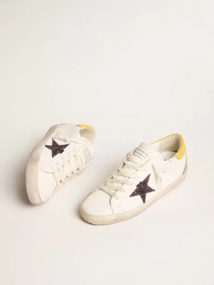 Super-Star para mujer con estrella roja brillante y lengüeta de cuero en el talón