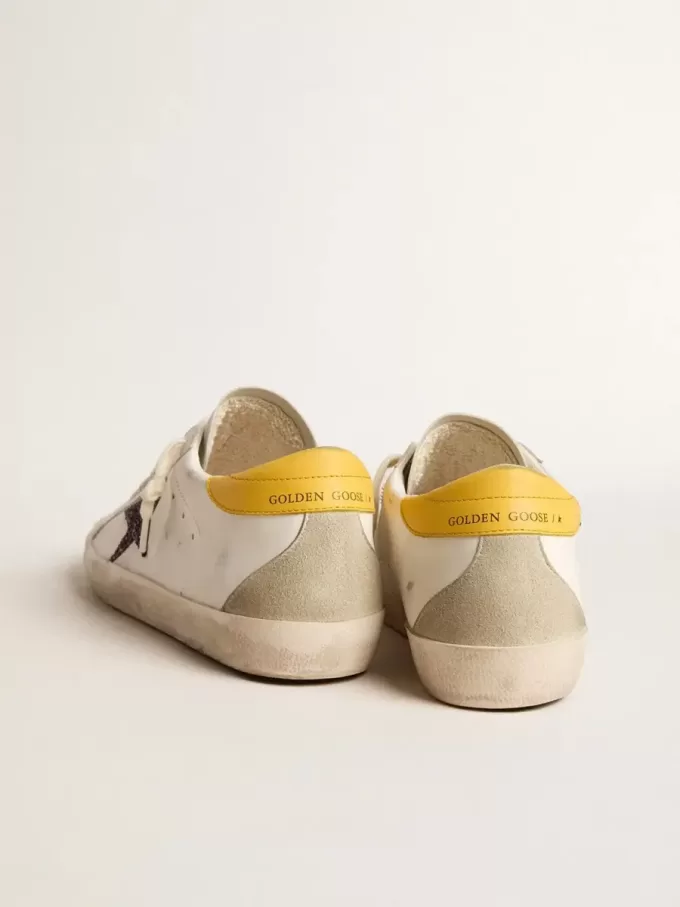 Super-Star para mujer con estrella roja brillante y lengüeta de cuero en el talón