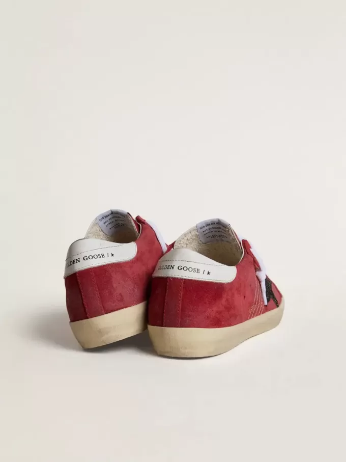 Super-Star para mujer en ante rojo con estrella brillante y lengüeta blanca en el talón