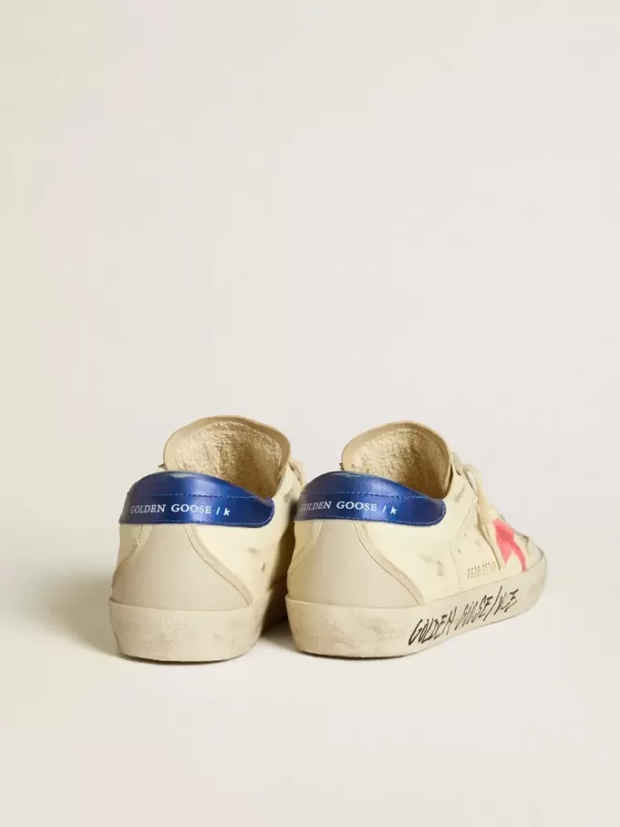 Super-Star para mujer en napa con estrella de ante y lengüeta metálica en el talón