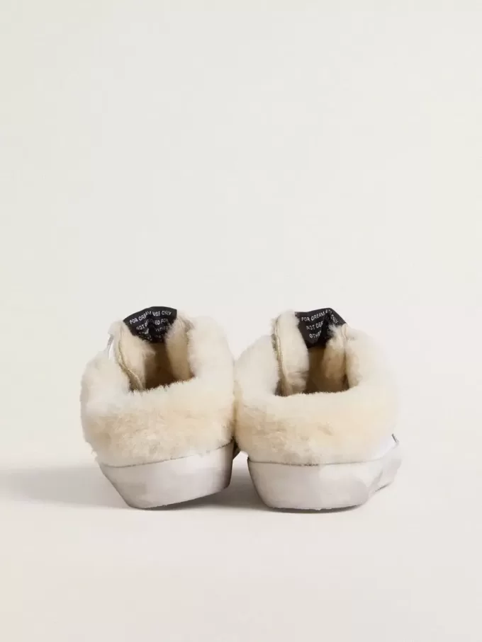 Super-Star Sabots en piel blanca con forro de borreguillo y estrella plateada