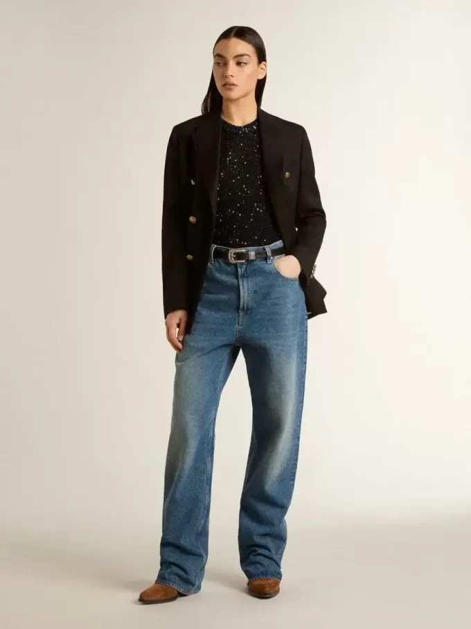 Top de malla negra con lentejuelas y detalles en contraste