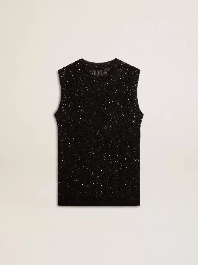 Top de malla negra con lentejuelas y detalles en contraste