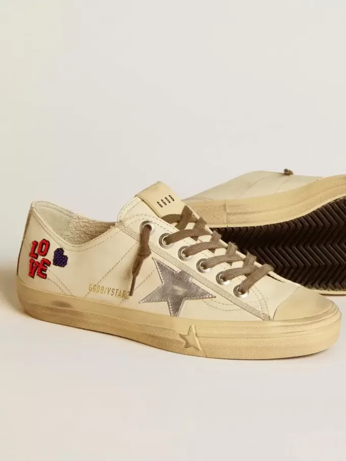 V-Star en napa cruda con estrella de napa plateada y bordado con abalorios