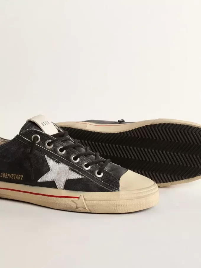 V-Star LTD en piel azul con estrella de piel metalizada plateada