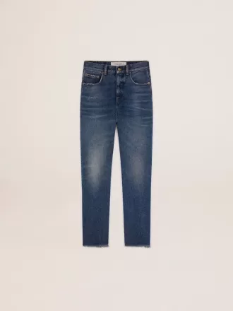 Vaqueros acampanados cropped para mujer con lavado medio