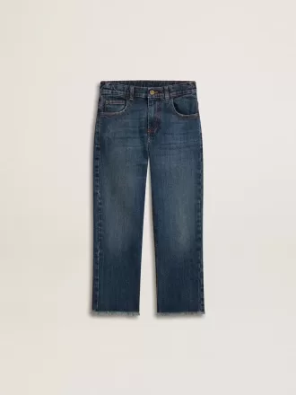 Vaqueros de denim para niño con borde sin rematar y bordados