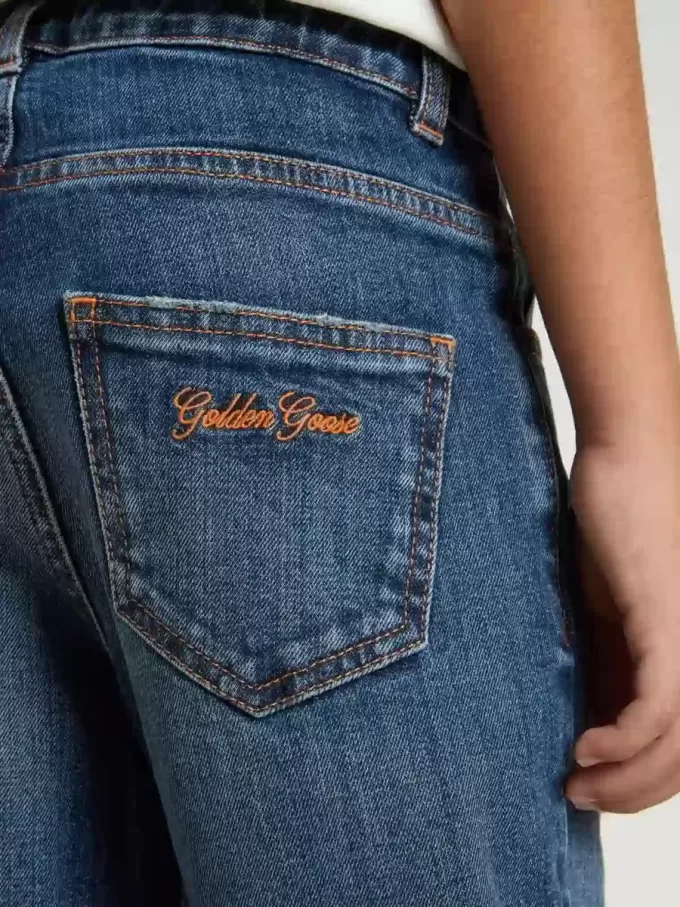 Vaqueros de denim para niño con borde sin rematar y bordados Vaqueros de denim para niño con borde sin rematar y bordados