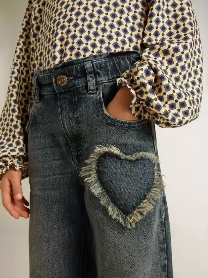 Vaqueros de pierna ancha para niña en denim azul Vaqueros de pierna ancha para niña en denim azul