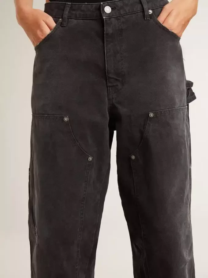 Vaqueros negros de algodón desgastados para mujer con parches en la parte delantera