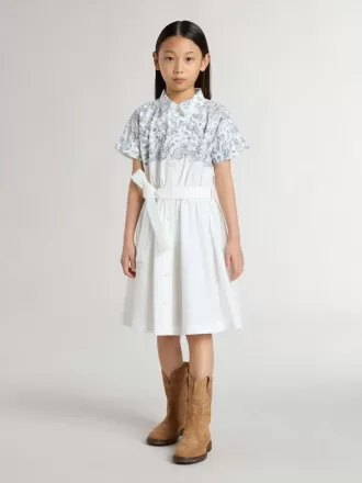 Vestido camisero para niña en lona de algodón blanca con estampado náutico azul y ribetes blancos