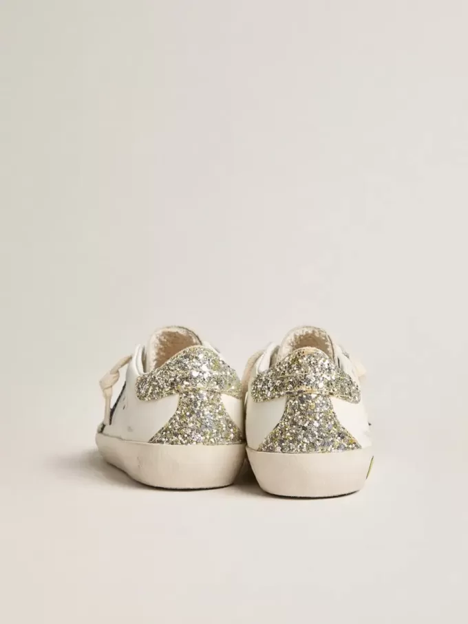 Young Super-Star en piel con estrella brillante y lengüeta en el talón